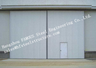 Sectional Horizontal Industrial Sliding Doors With Access Pedestrian Door For Workshop